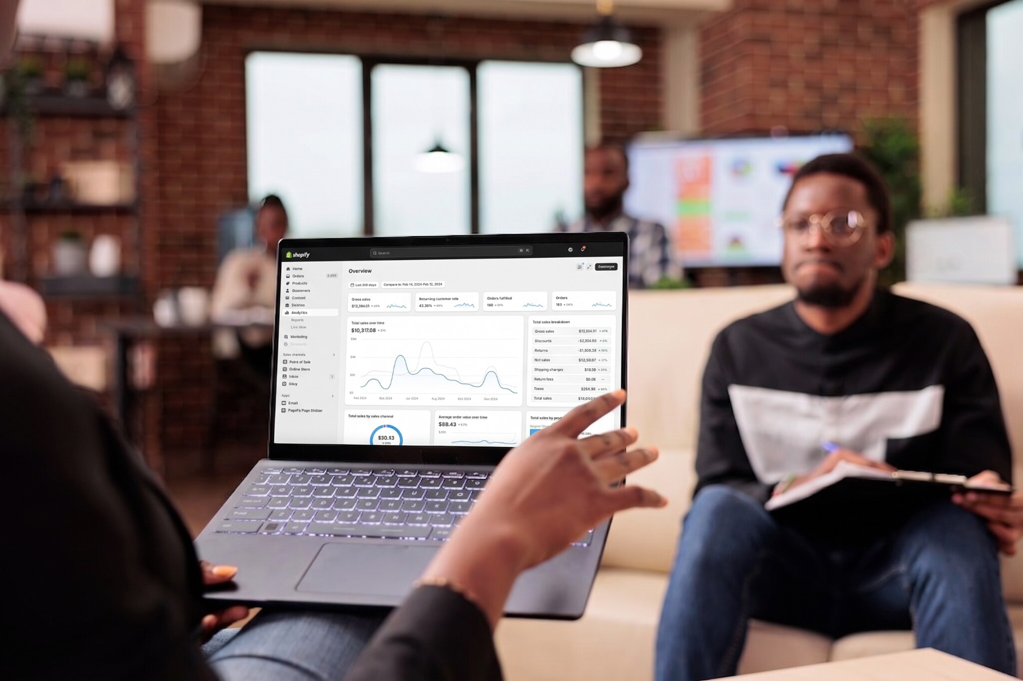 Shopify specialists reviewing a live ecommerce analytics dashboard